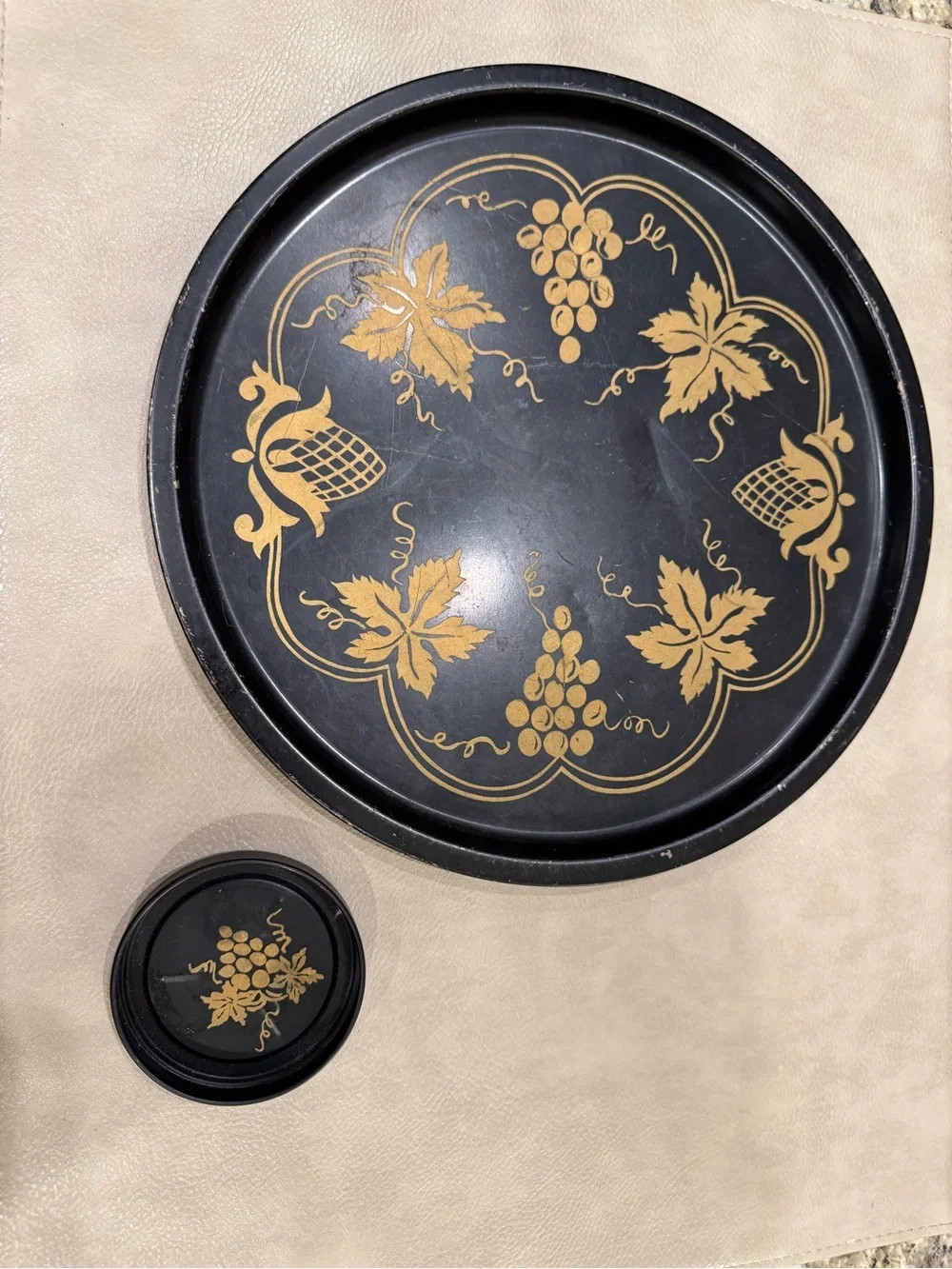Vintage mid-century black and gold metal tray and coaster